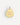 The back of a scallop shell-shaped pendant engraved with the text 'Meet Me by the Sea - Le Bungalow'