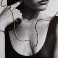 Woman with gold chain