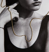 Woman with gold chain