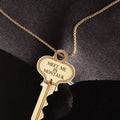 Key with Meet Me in Montauk on a gold chain