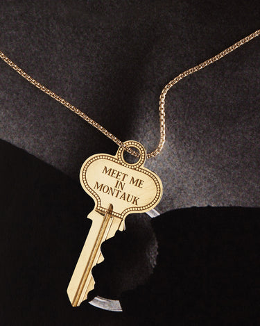 Key with Meet Me in Montauk on a gold chain