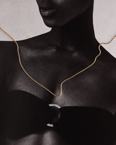 Woman wearing a gold chain