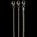 Three white gold chain necklaces with clasp ends